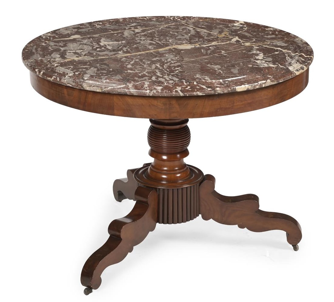 A CONTINENTAL MAHOGANY AND MARBLE TOPPED PEDESTAL CENTRE TABLE, CIRCA 1830: A CONTINENTAL MAHOGANY AND MARBLE TOPPED PEDESTAL CENTRE TABLE CIRCA 1830 With recessed castors 77cm high, 101cm diameter Condition Report: PLEASE NOTE: ALL LOTS ARE LOCATED AT SACKVILLE WEST STORAGE