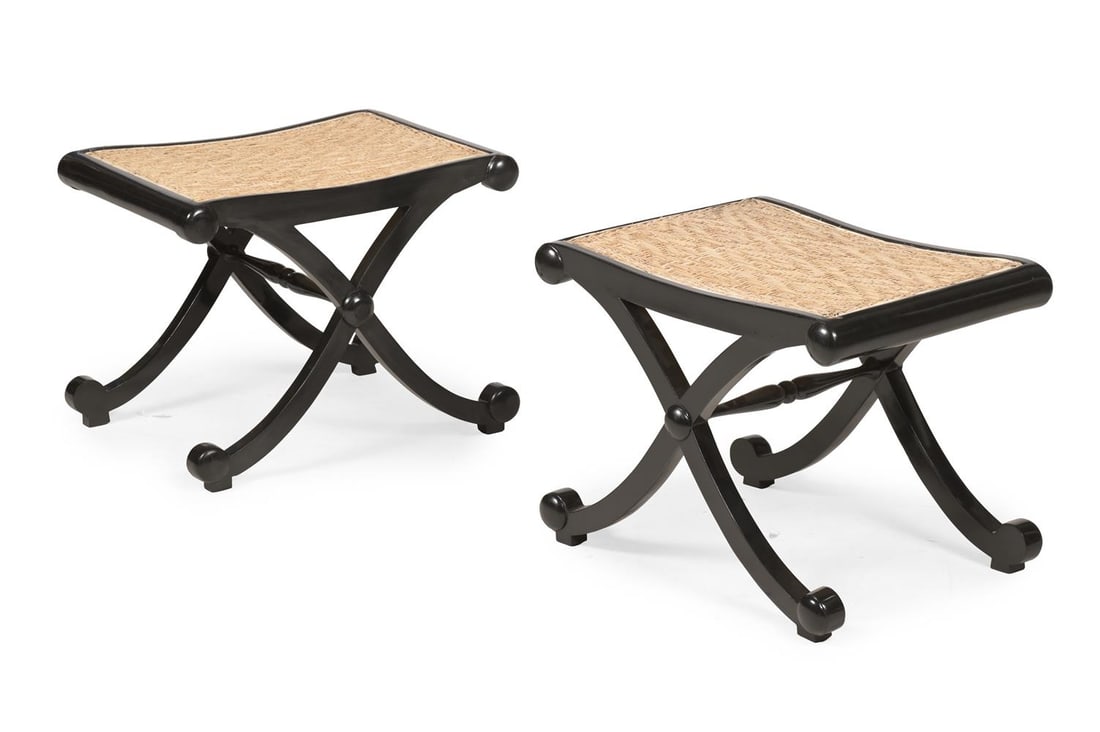 Y A PAIR OF EBONY 'X' FRAMED STOOLS, IN REGENCY STYLE, LATE 20TH OR EARLY 21ST CENTURY: Y A PAIR OF EBONY 'X' FRAMED STOOLS IN REGENCY STYLE, PROBABLY INDIAN, LATE 20TH OR EARLY 21ST CENTURY Each with woven split cane mat panel scenes each 43cm high, 56cm wide, 42cm deep
