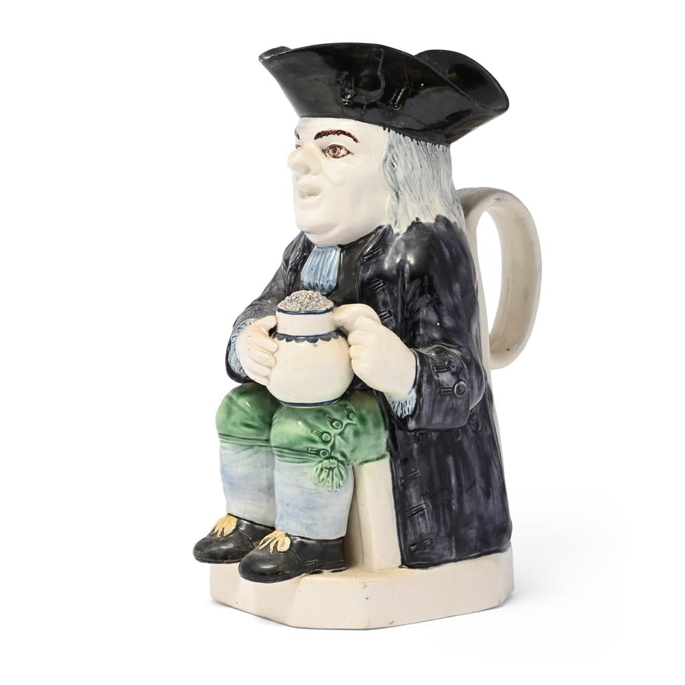 A T.J. HOLLINS (SHELTON) STAFFORDSHIRE CREAMWARE TOBY JUG, CIRCA 1800 - 2
