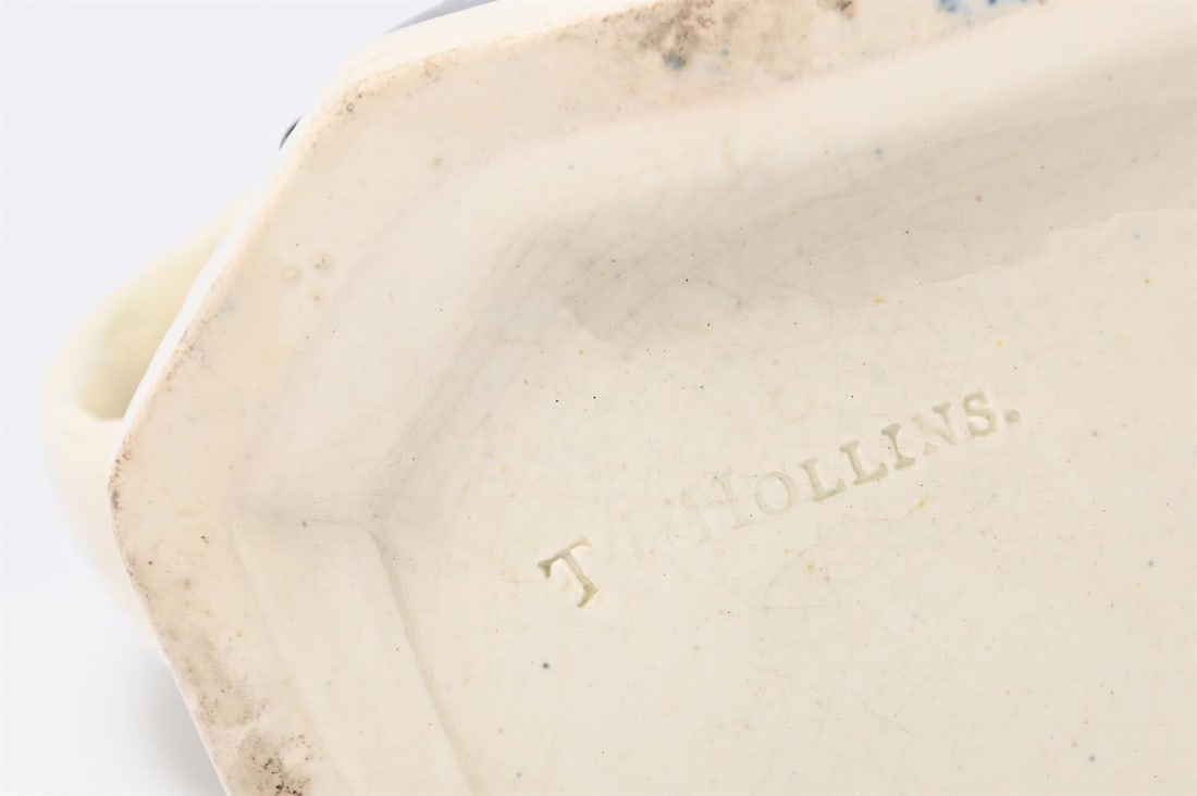 A T.J. HOLLINS (SHELTON) STAFFORDSHIRE CREAMWARE TOBY JUG, CIRCA 1800 - 4