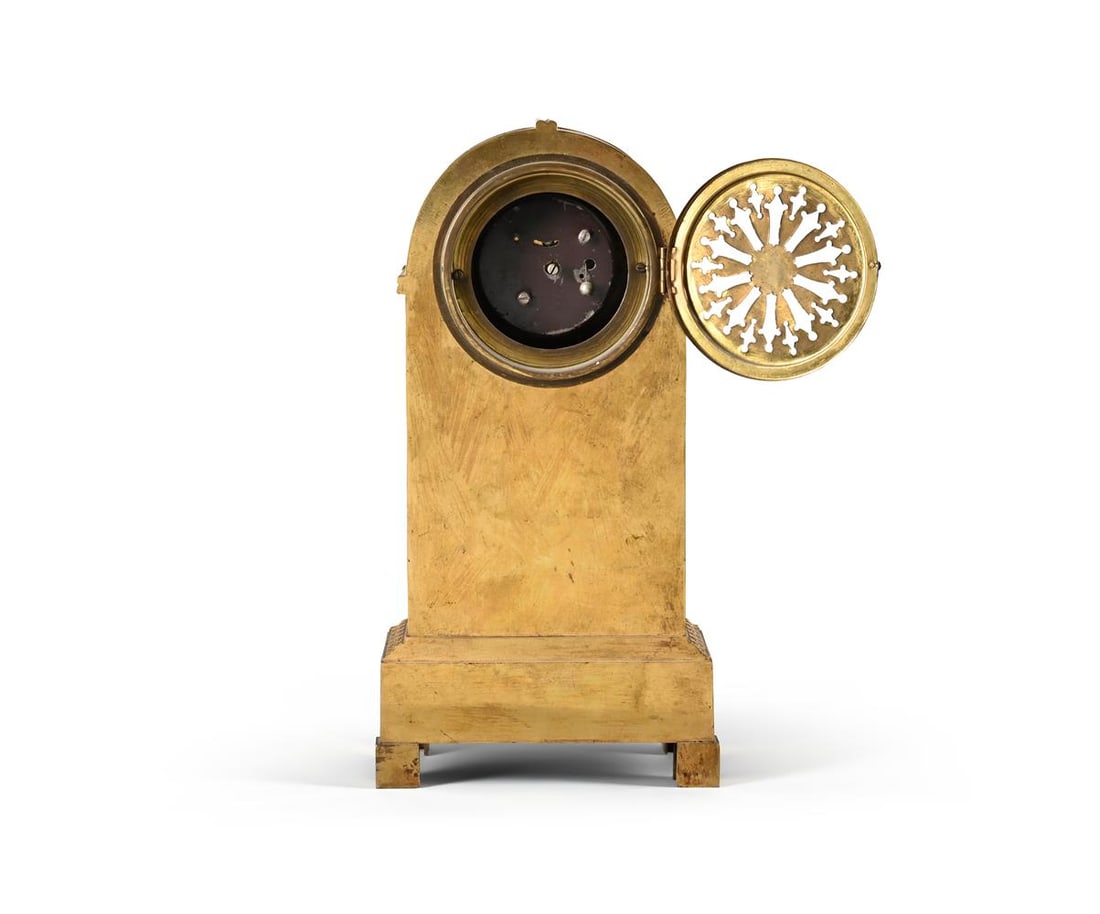 A FRENCH EMPIRE ORMOLU CLOCK CASE AND DIAL AND A PAIR OF CANDELABRA, EARLY 19TH CENTURY AND LATER - 2