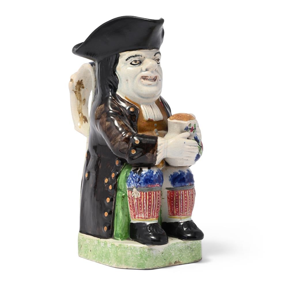A BRITISH POTTERY SPONGE-DECORATED TOBY JUG, POSSIBLY SCOTTISH, CIRCA 1830: A BRITISH POTTERY SPONGE-DECORATED TOBY JUG, POSSIBLY SCOTTISH CIRCA 1830 25cm high Condition Report: PLEASE NOTE: ALL LOTS ARE LOCATED AT SACKVILLE WEST STORAGE IN ANDOVER (SP10 3SA) AND ARE NOT