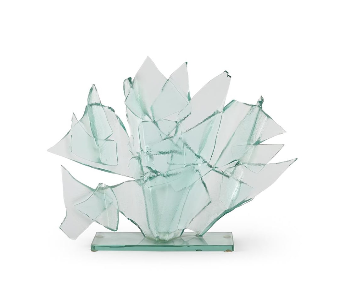 λ VERONIQUE MONOD, SCULPTURE, 1987: λ VERONIQUE MONOD SCULPTURE, 1987 Glass, with green tint, textured surface to conjoined shards, mounted on a rectangular plinth base. Incised artist's signature and date 46cm high, 64cm