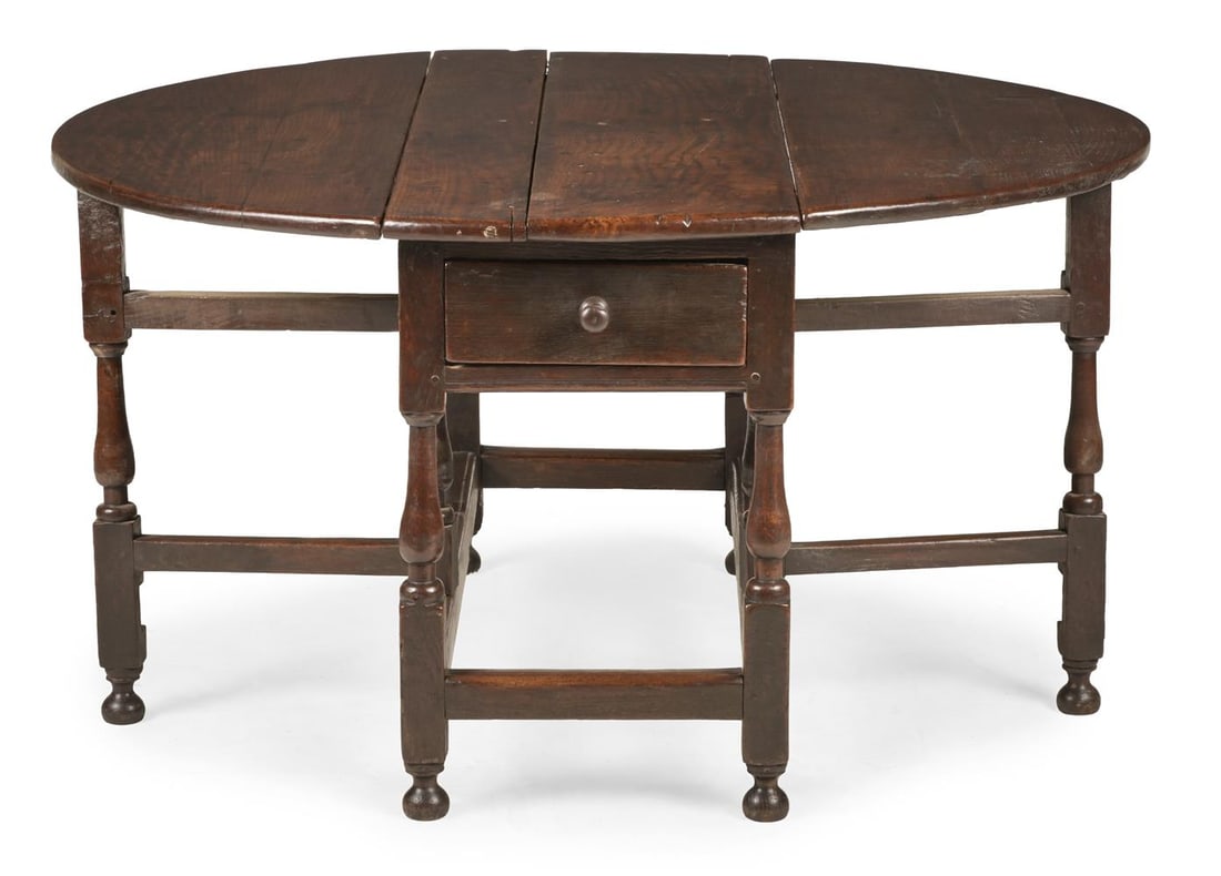 A CHARLES II ELM AND OAK GATELEG DINING TABLE, CIRCA 1680 - 2