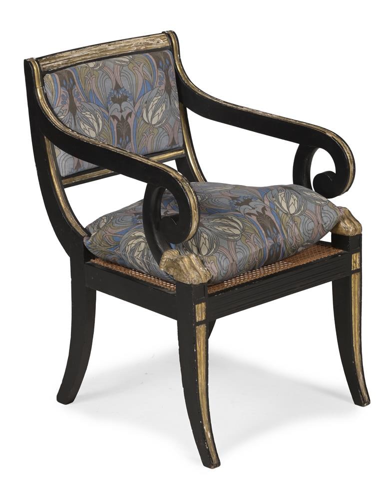 A REGENCY EBONISED AND PARCEL GILT OPEN ARMCHAIR, CIRCA 1820 - 2