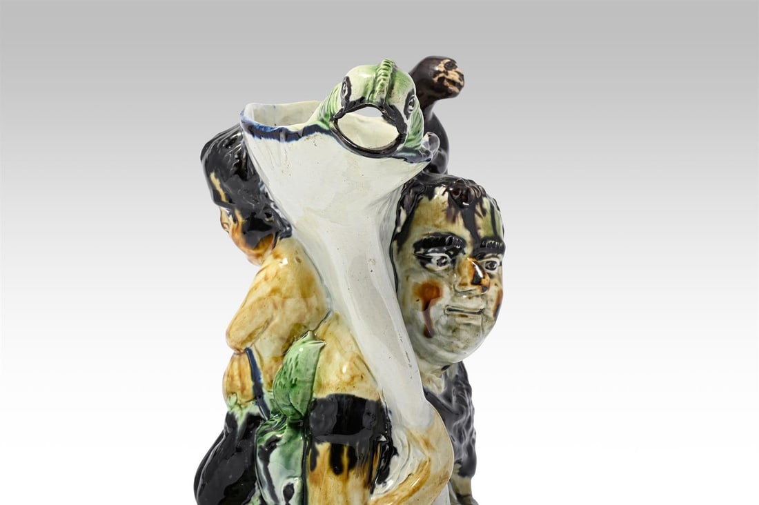 A STAFFORDSHIRE PEARLWARE 'BACCHUS AND PAN' JUG AFTER THE MODEL BY JEAN VOYEZ, CIRCA 1800 - 3