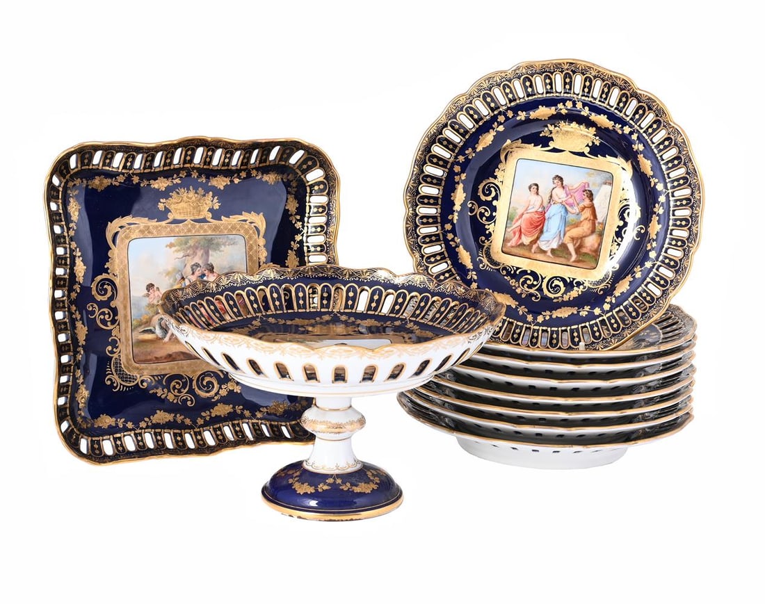 A VIENNA-STYLE BLUE-GROUND AND GILT PORCELAIN PART DESSERT SERVICE, FIRST QUARTER 20TH CENTURY (1 of 3)