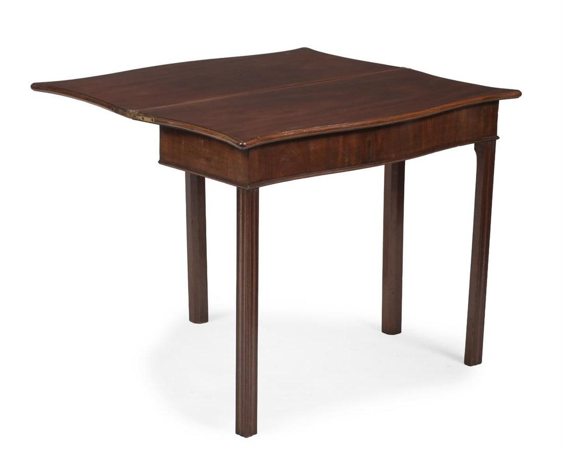 A GEORGE III MAHOGANY SERPENTINE FRONTED FOLD OVER TEA TABLE, CIRCA 1770 - 3