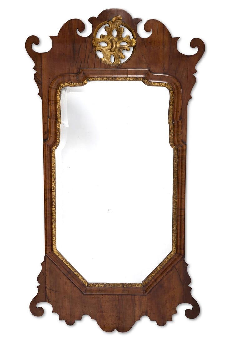 A GEORGE II WALNUT AND PARCEL GILT FRET-CARVED MIRROR, CIRCA 1740 (1 of 1)