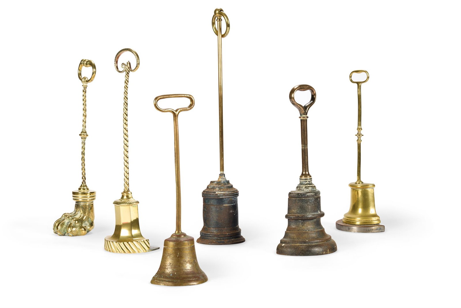 A GROUP OF SIX BRASS AND CAST IRON DOOR PORTERS OR DOOR STOPS, 19TH AND EARLY 20TH CENTURY (1 of 1)