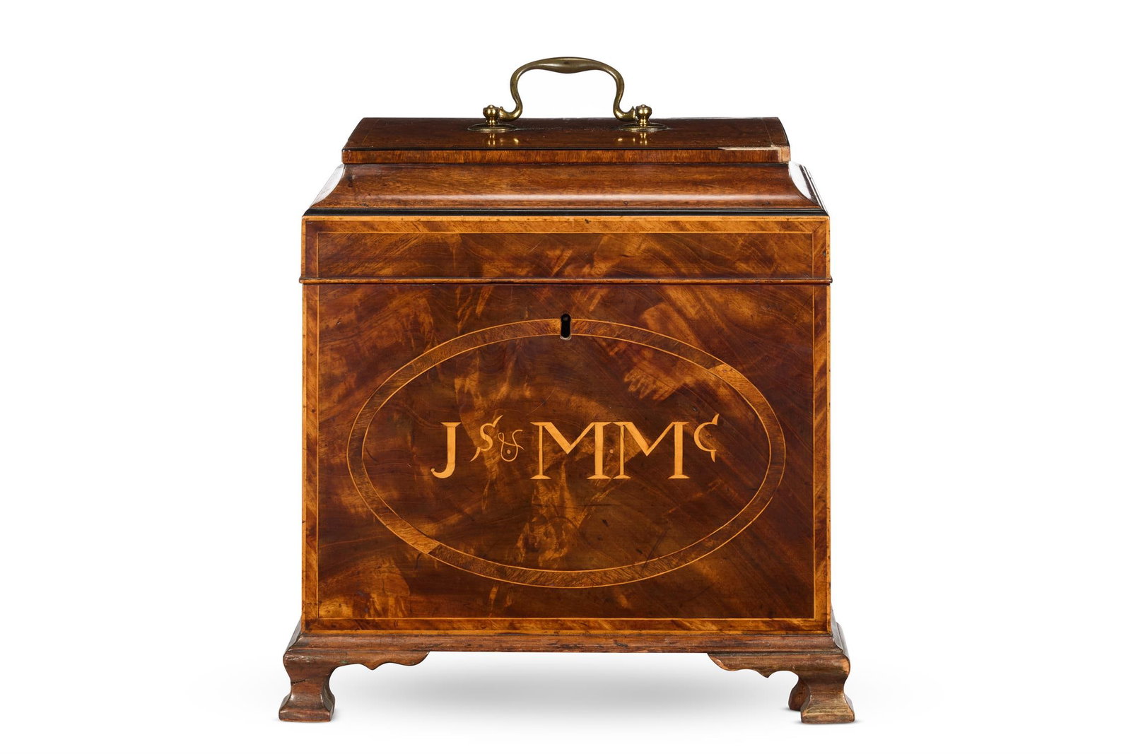 A GEORGE III MAHOGANY, MARQUETRY AND EBONISED CELLARET, CIRCA 1800: A GEORGE III MAHOGANY, MARQUETRY AND EBONISED CELLARETCIRCA 1800The cavetto moulded lid with a brass handle, the front inlaid and initialled Js MMc, the baize-lined interior with four antique glass de