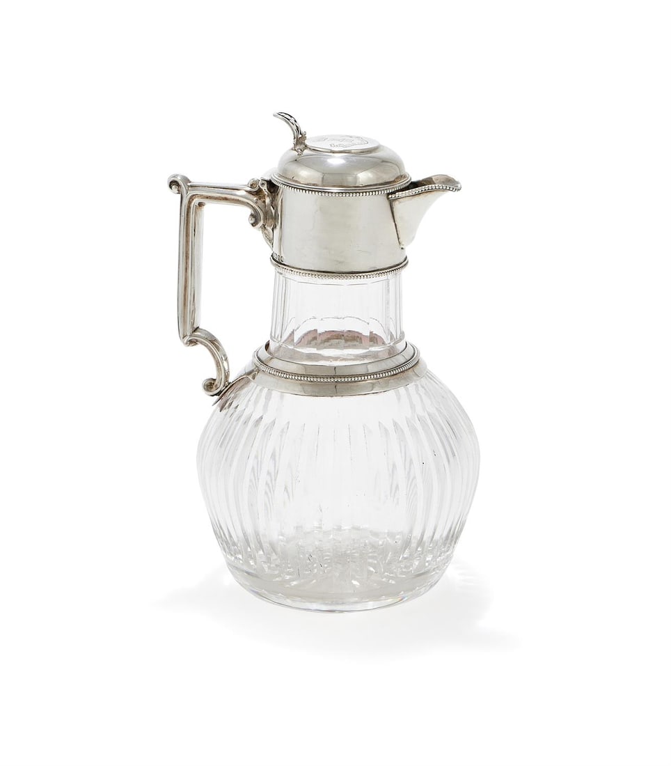 A VICTORIAN SILVER MOUNTED GLOBULAR GLASS CLARET JUG, W. & G. SISSONS, SHEFFIELD 1880: A VICTORIAN SILVER MOUNTED GLOBULAR GLASS CLARET JUGW. & G. SISSONS (WILLIAM & GEORGE SISSONS), SHEFFIELD 1880The domed cover with a pierced thumb piece and engraved with a coronet above a crest and a