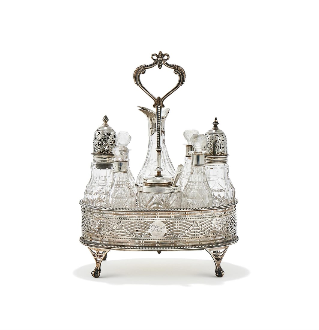 A GEORGE III SILVER OVAL CRUET STAND, PROBABLY BY THOMAS DANIELL, LONDON CIRCA 1775 (1 of 4)