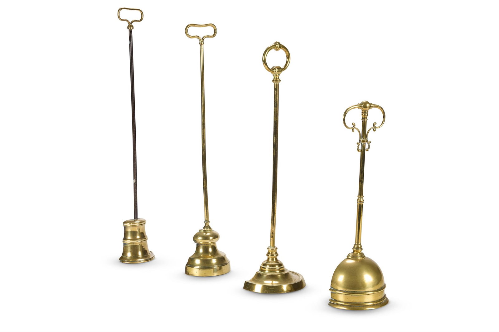 FOUR LARGE BRASS DOOR PORTERS OR DOOR STOPS, LATE 19TH/EARLY 20TH CENTURY (1 of 1)
