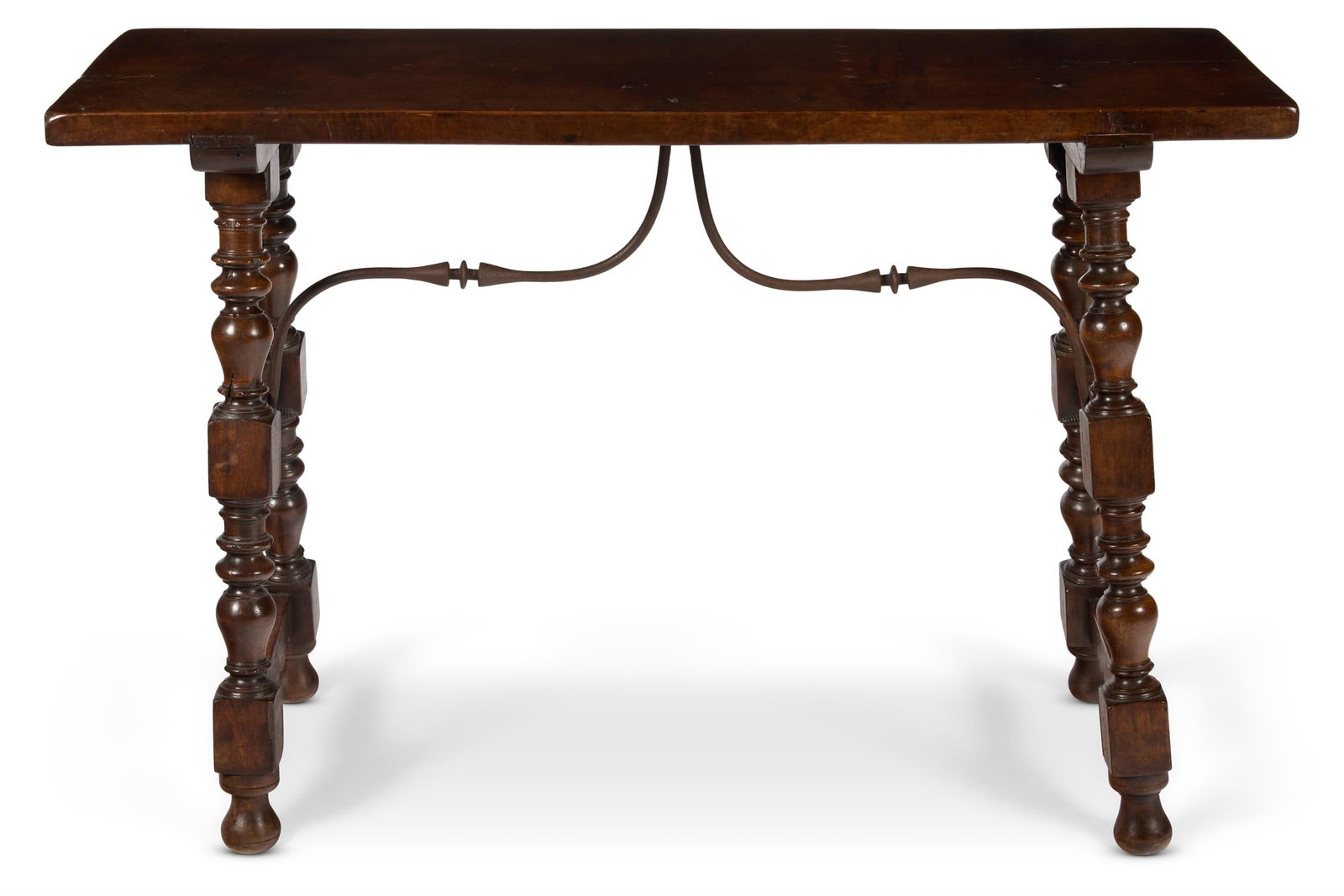 A SPANISH WALNUT AND WROUGHT IRON SIDE TABLE, POSSIBLY 18TH CENTURY: A SPANISH WALNUT AND WROUGHT IRON SIDE TABLEPOSSIBLY 18TH CENTURYWith a plank top and splayed turned legs secured by wrought iron brackets81cm high, 121cm wide, 39cm deepProvenance:Acquired from M. Ch