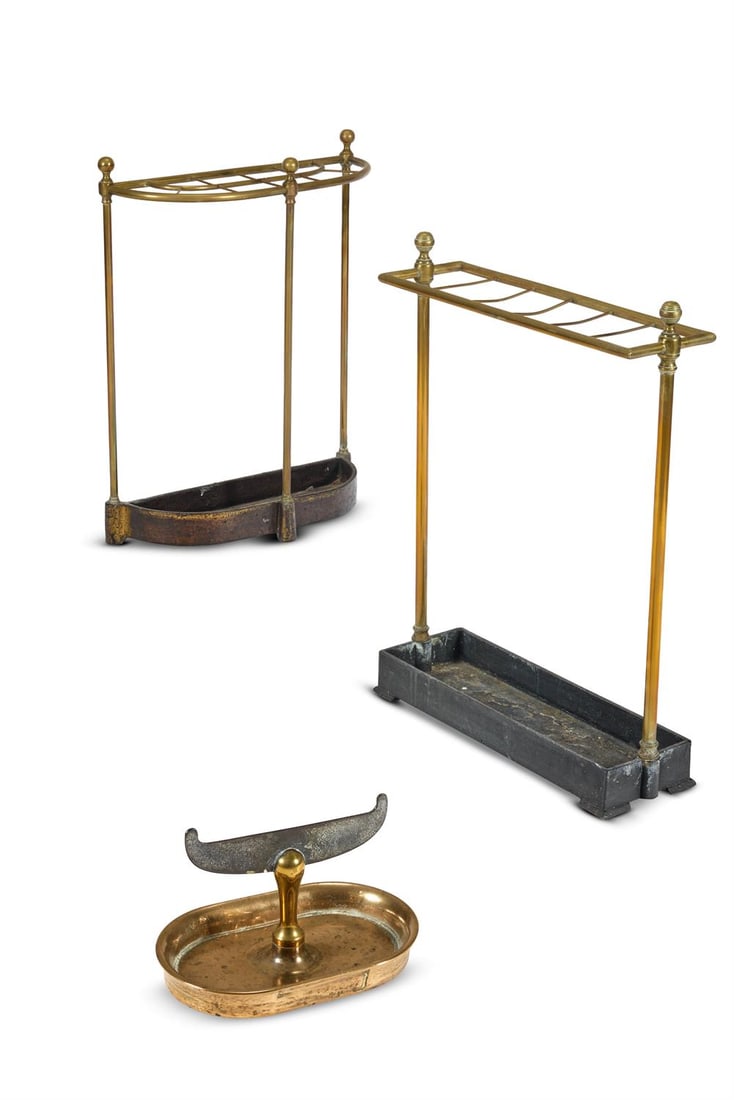 TWO EDWARDIAN BRASS AND CAST IRON STICK STANDS, EARLY 20TH CENTURY (1 of 2)
