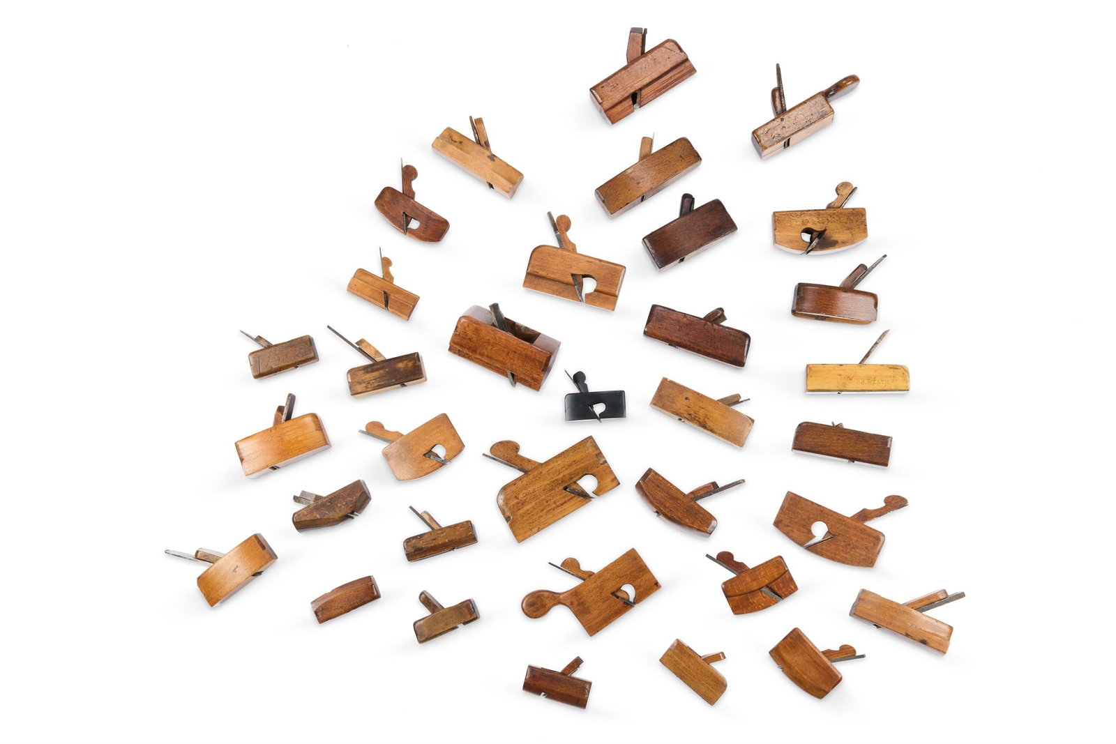 A COLLECTION OF THIRTY MINIATURE TREEN PLANES, 19TH CENTURY (1 of 2)