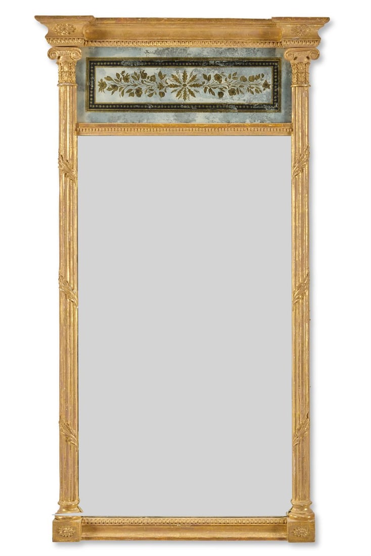 A REGENCY GILTWOOD AND VERRE EGLOMISE PIER GLASS, EARLY 19TH CENTURY (1 of 2)