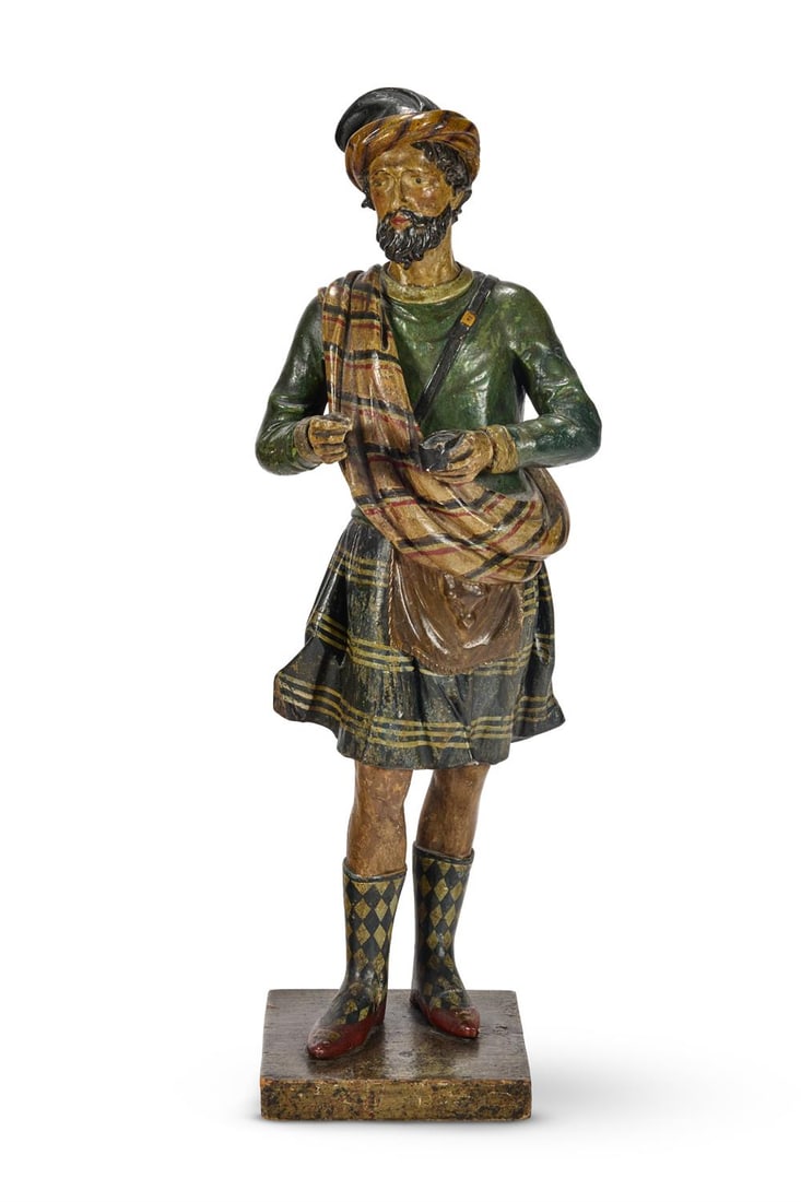 A TOBACCONIST'S POLYCHROME CARVED WOOD 'HIGHLANDER' ADVERTISING FIGURE, SECOND HALF 19TH CENTURY (1 of 3)