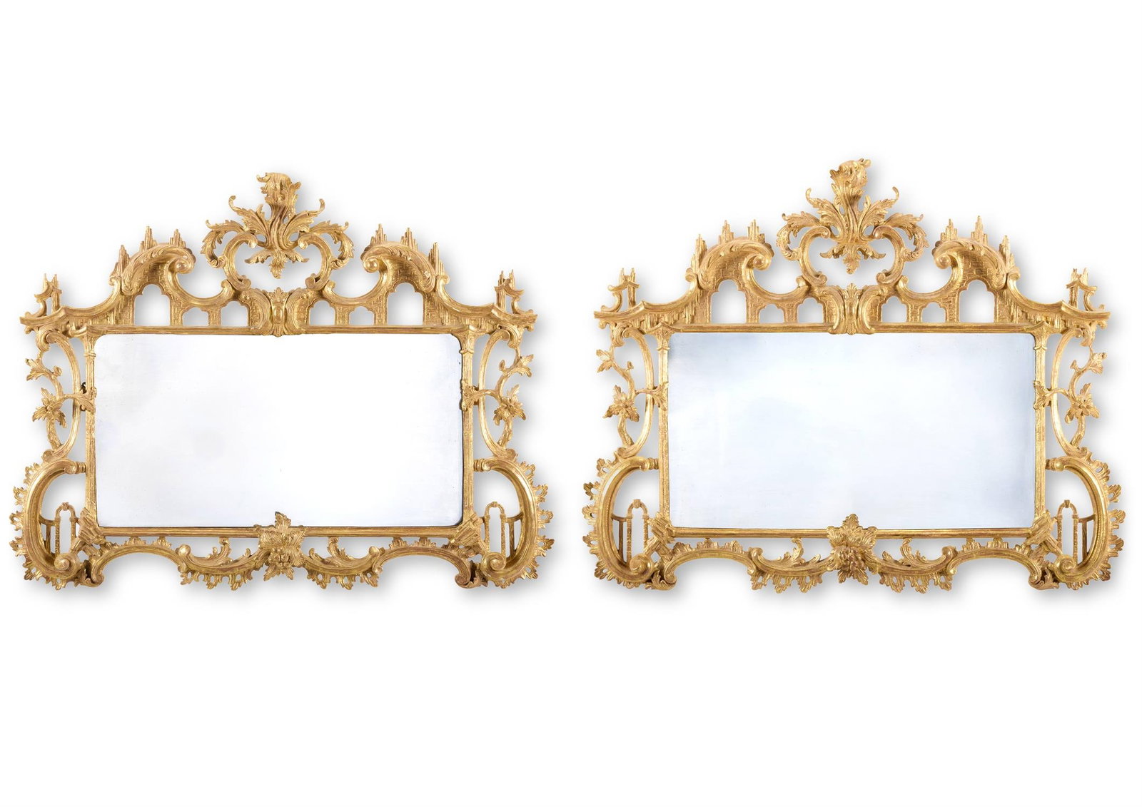 A PAIR OF CARVED GILTWOOD MIRRORS, OF IRISH GEORGE II STYLE, ONE MID 18TH CENTURY (1 of 2)
