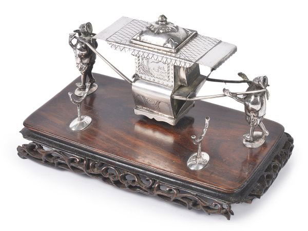 A Chinese export silver novelty inkstand by Wang H: A Chinese export silver novelty inkstand by Wang Hing & Co., Hong Kong, Canton & Shanghai ('WH', '90' and a character mark), fl. circa 1854-1925, circa 1900, modelled as a palanquin being carr