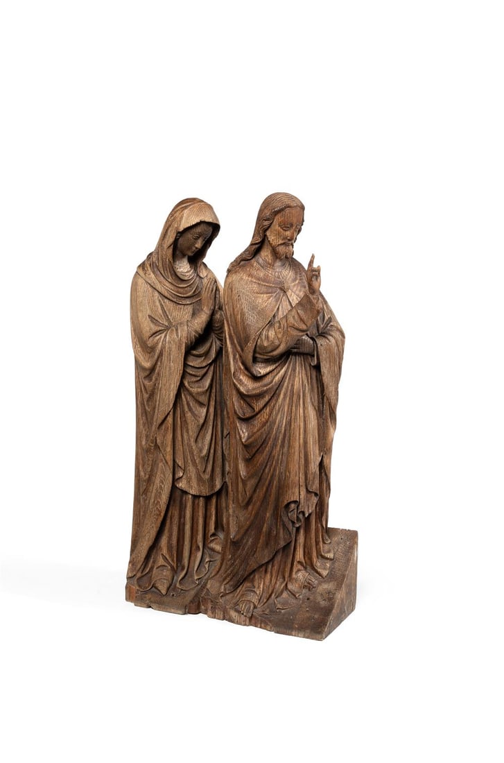 A CARVED OAK GROUP OF CHRIST AND MARY AT THE WEDDING AT CANA, FLEMISH: A CARVED OAK GROUP OF CHRIST AND MARY AT THE WEDDING AT CANAFLEMISH, PROBABLY EARLY 16TH CENTURYIn the attitude of blessing, with the Virgin standing behind68.5cm high