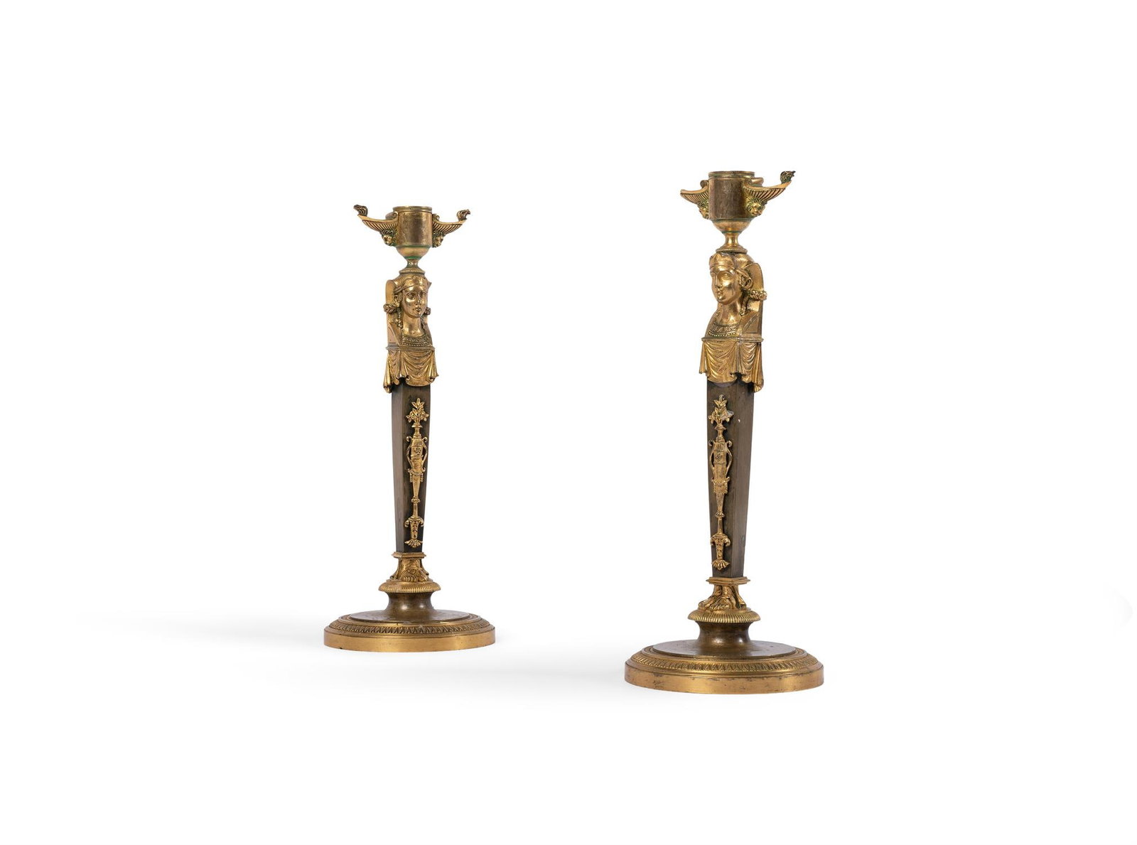 A PAIR OF FRENCH EMPIRE GILT AND PATINATED BRONZE CANDLESTICKS, EARLY 19TH CENTURY (1 of 4)