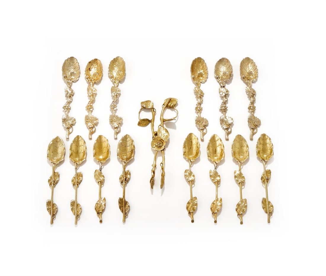SIX VICTORIAN SILVER GILT SPOONS, JOHN WILMIN FIGG, LONDON 1844 (4) AND 1873 (2): SIX VICTORIAN SILVER GILT SPOONSJOHN WILMIN FIGG, LONDON 1844 (4) AND 1873 (2)With leaf shaped bowl and foliate stems12cm longTogether with:EIGHT SIMILAR SILVER GILT SPOONSUNMARKED12cm longA PAIR OF S