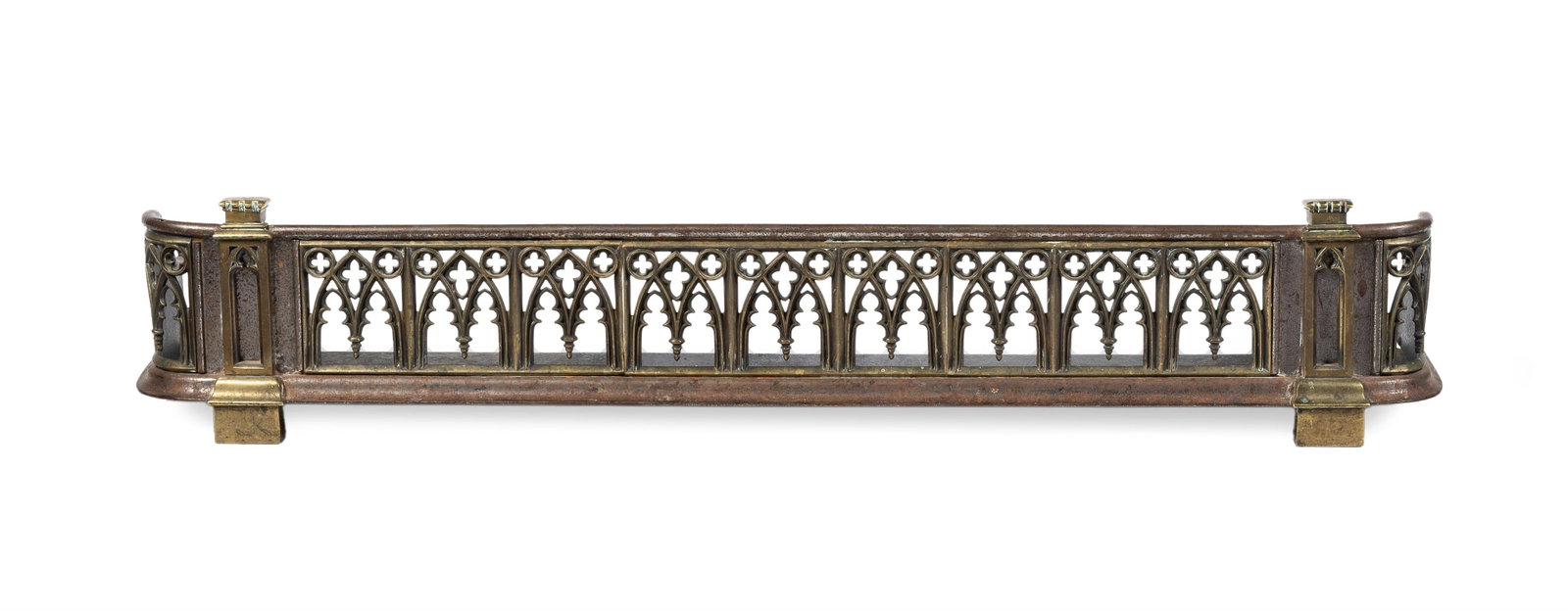 AN EARLY VICTORIAN BRASS MOUNTED POLISHED STEEL 'GOTHIC' FENDER, MID 19TH CENTURY (1 of 3)