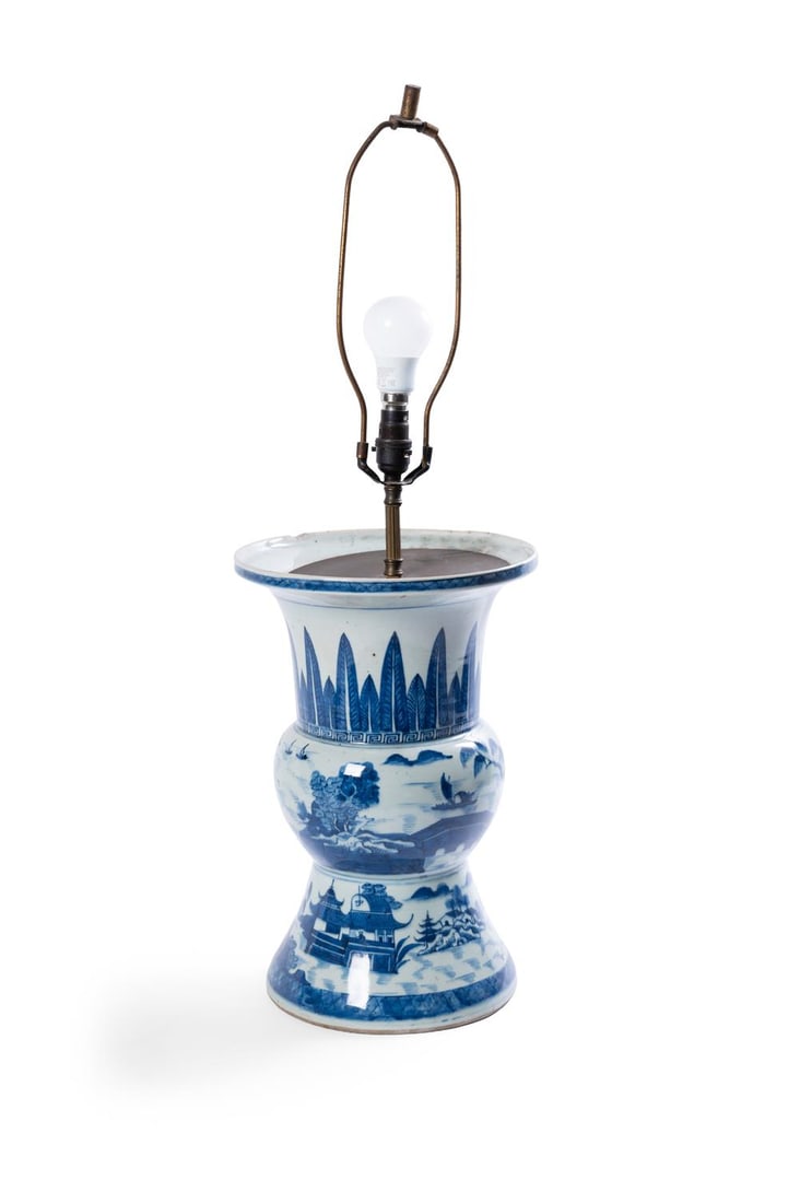 A CHINESE BLUE AND WHITE GU VASE, 19TH CENTURY: A CHINESE BLUE AND WHITE GU VASE19TH CENTURYDecorated with pavilions and riverscapethe vase 39.5cm high, later adapted for electricity