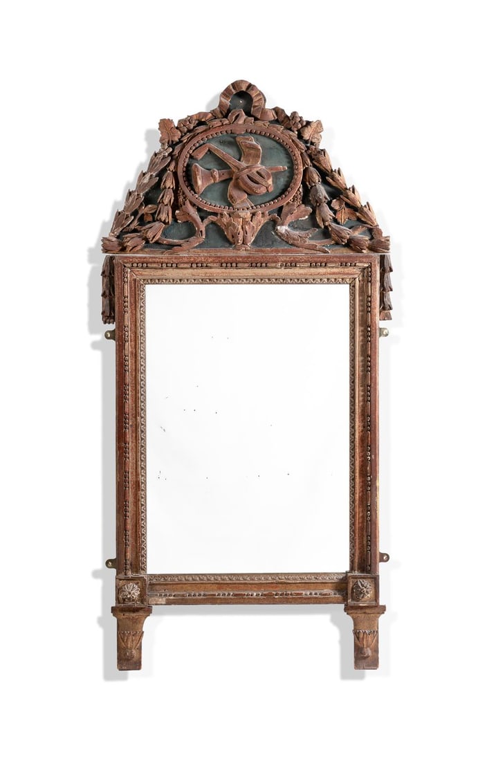 A GILTWOOD AND GREEN PAINTED MIRROR, ITALIAN: A GILTWOOD AND GREEN PAINTED MIRRORITALIAN, EARLY 19TH CENTURYThe rectangular plate within a stiff-leaf and beaded surround surmounted by a dark green painted ribbon and swag cresting centred by a mus