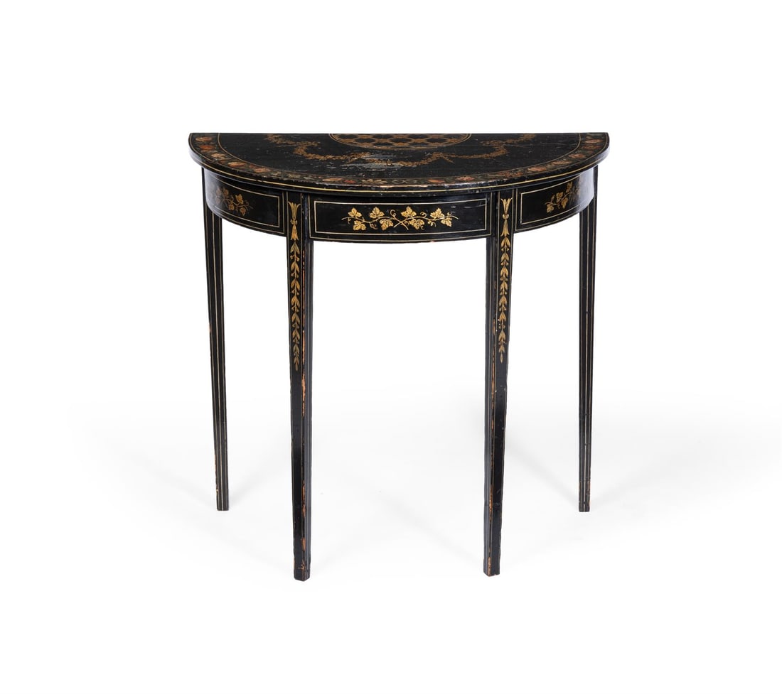 A GEORGE III BLACK AND POLYCHROME PAINTED AND PARCEL GILT DEMI-LUNE SIDE TABLECIRCA 1800 (1 of 2)