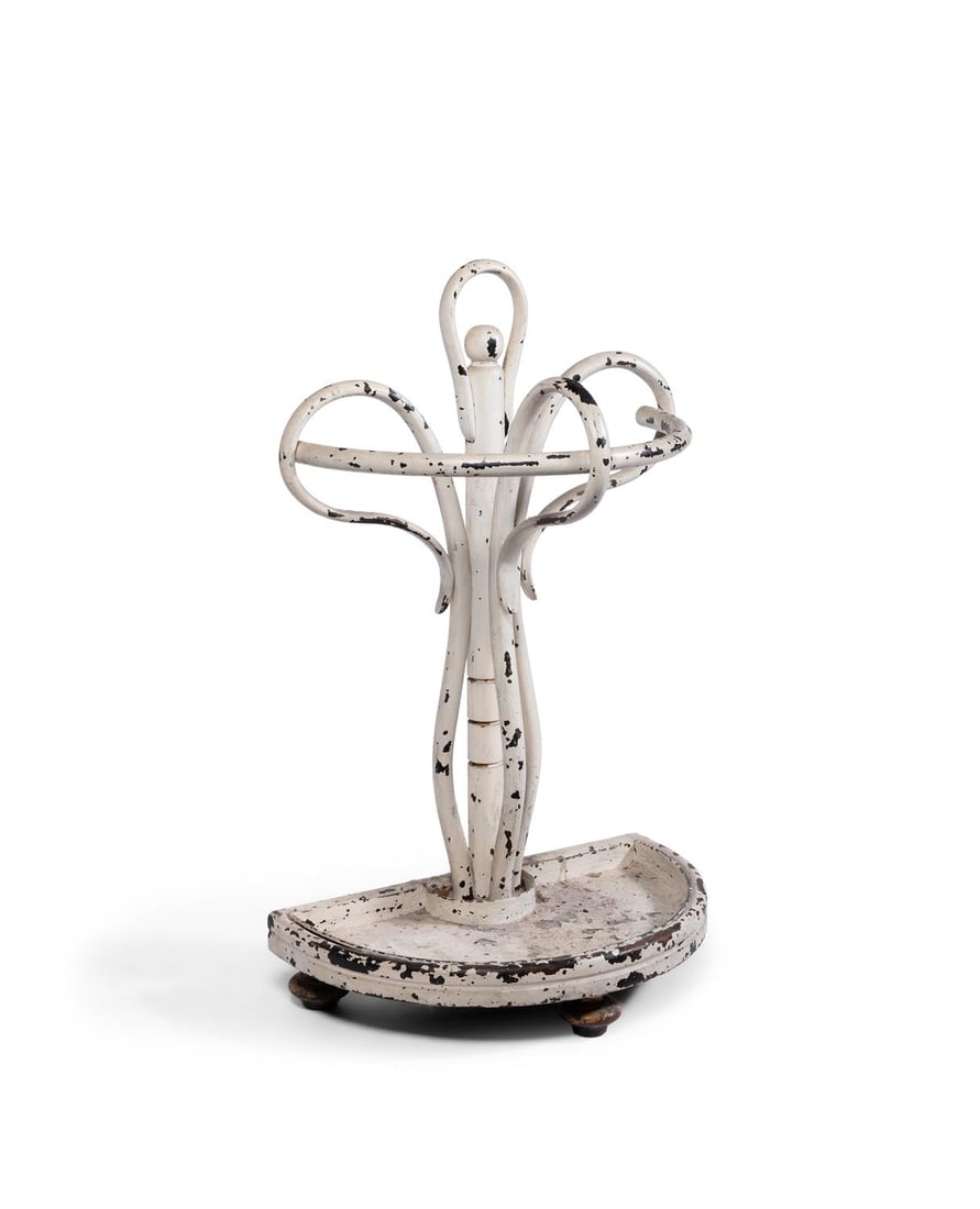 A WHITE PAINTED BENT WOOD STICK STAND, LATE 19TH CENTURY: A WHITE PAINTED BENT WOOD STICK STAND LATE 19TH CENTURY Of half-round form with a painted metal drip tray 87cm high 54cm wide, 34cm deep