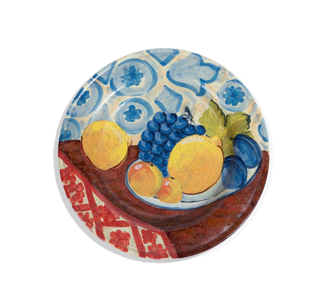 A POTTERY CHARGER PAINTED WITH FRUIT, MODERN (1 of 2)