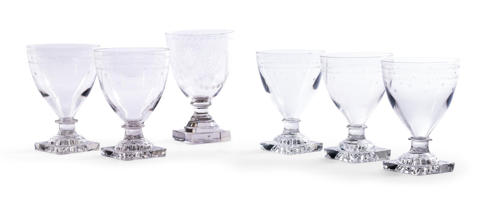 A SET OF FIVE ENGRAVED GLASS RUMMERS, 19TH CENTURY: A SET OF FIVE ENGRAVED GLASS RUMMERS 19TH CENTURYWith 'lemon squeezer' bases, 13cm highTogether with one other, 14.5cm high