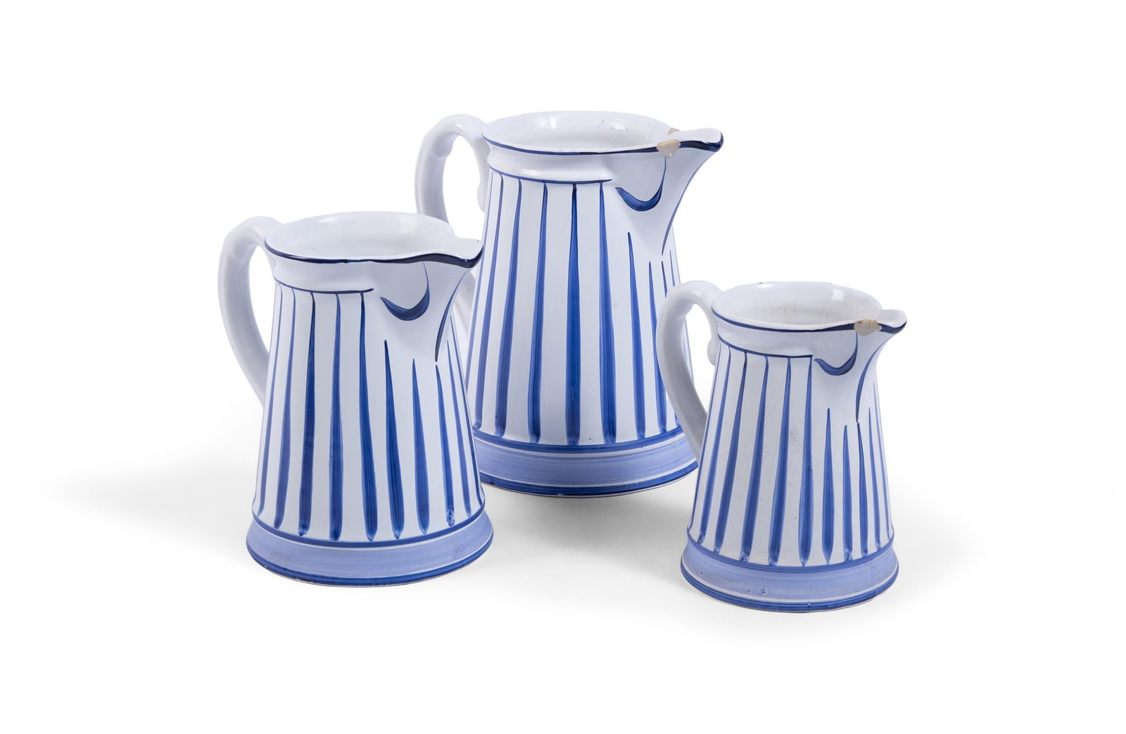 A GRADUATED SET OF THREE POTTERY JUGS, PORTUGUESE (1 of 2)