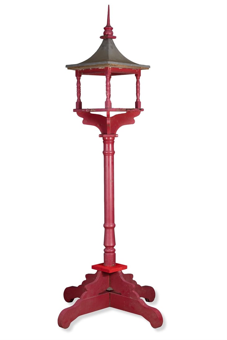 A RED PAINTED GARDEN BIRD HOUSE, LATE 20TH CENTURY: A RED PAINTED GARDEN BIRD HOUSE LATE 20TH CENTURY Of swept pagoda form, wood and fibreglass with metal effect skin approximately 229cm high, 98cm wide and deep at the base