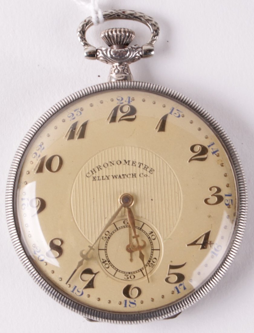 Elly Watch Co, a slim 1920's silver coloured pocke: Elly Watch Co, a slim 1920's silver coloured pocket watch, the cream textured dial with gilt stylised Arabic numerals, subsidiary seconds dial and hands, the hinged two piece case housing an
