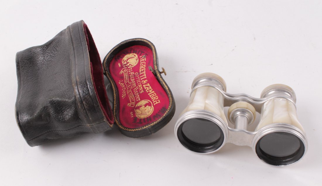 Negrettia & Zambra, a pair of mother of pearl oper: Negrettia & Zambra, a pair of mother of pearl opera glasses, signed to the eyepieces, in the original leather case