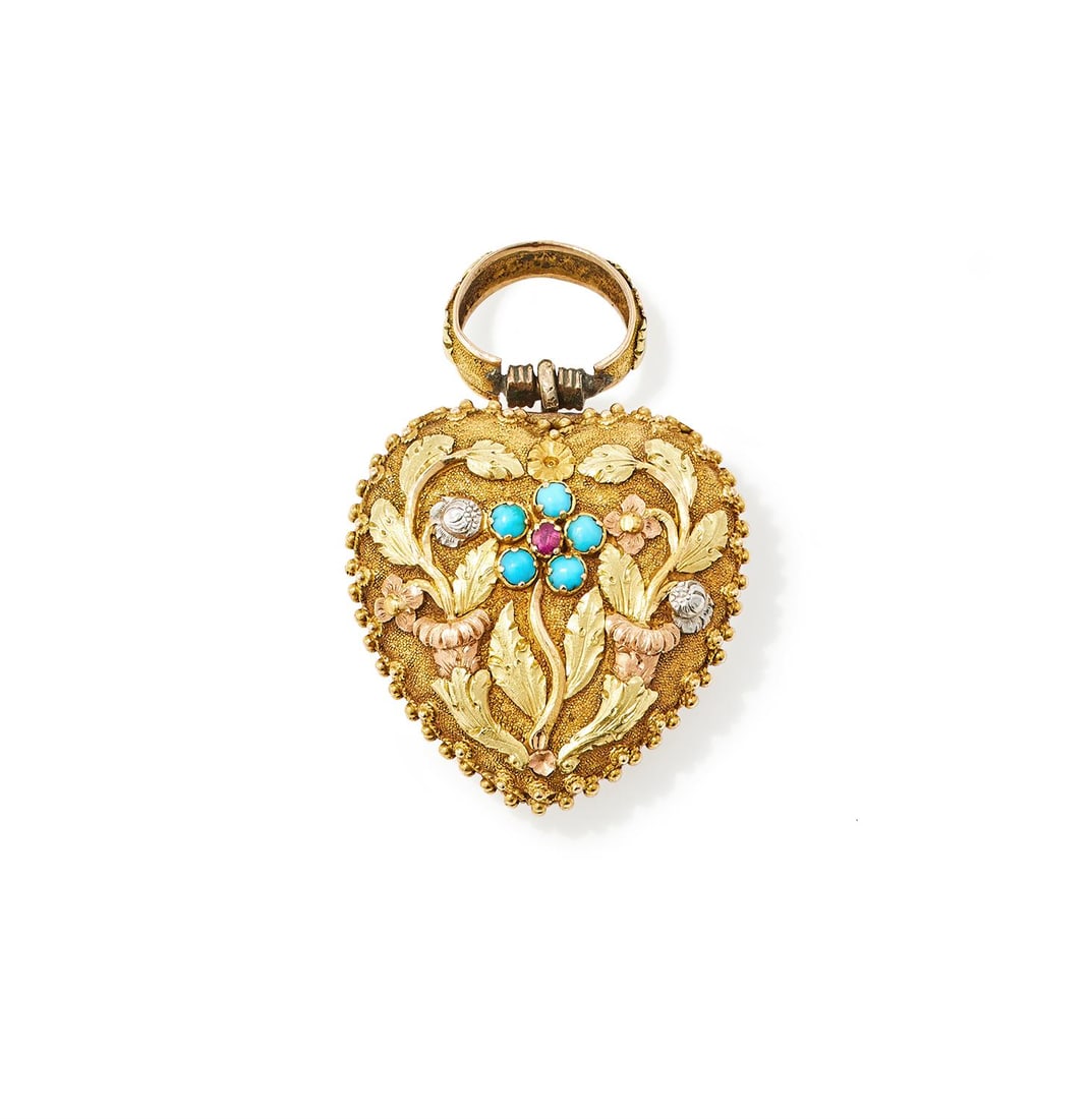 AN EARLY 19TH CENTURY TURQUOISE AND RUBY SET HEART SHAPED LOCKET: AN EARLY 19TH CENTURY TURQUOISE AND RUBY SET HEART SHAPED LOCKET CIRCA 1830S The heart shaped panel with chased leaves and two colour gold flowers on a textured ground, with a central cabochon turquoi