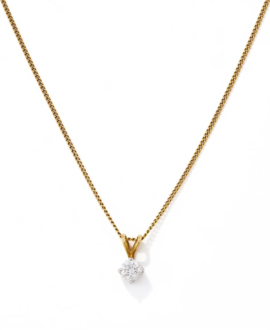 A DIAMOND SINGLE STONE PENDANT: A DIAMOND SINGLE STONE PENDANT The brilliant cut diamond in an 18ct gold four claw mount, to an 18ct gold curb link chain, UK hallmarksSize/dimensions: pendant 1.2cm long, chain 47cm long Gross weight