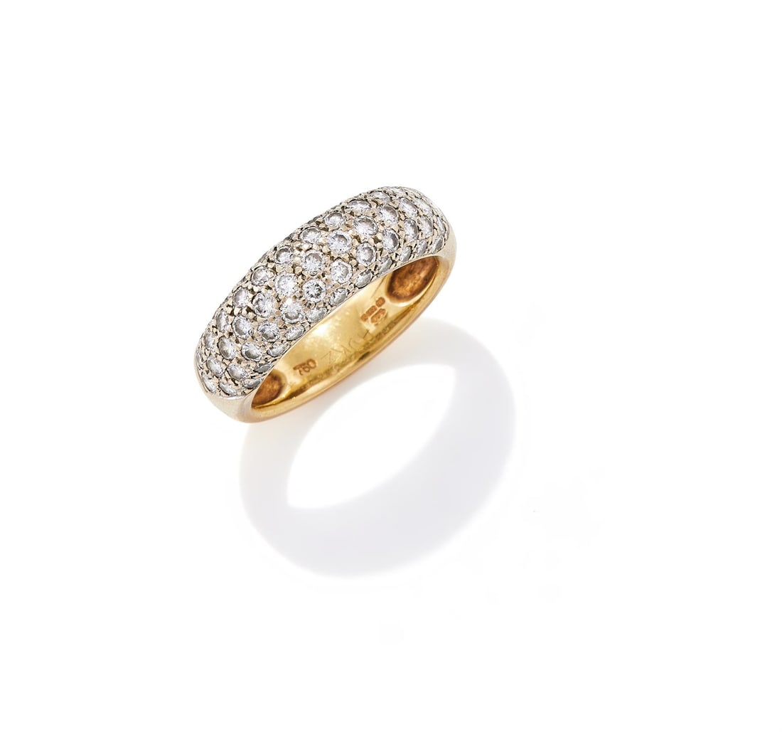 A DIAMOND DRESS RING: A DIAMOND DRESS RINGPavé set to the front with brilliant cut diamonds, mounted in 18ct gold, London hallmark, sponsor's mark TPSize/dimensions: ring size Gross weight: 6.0 grams