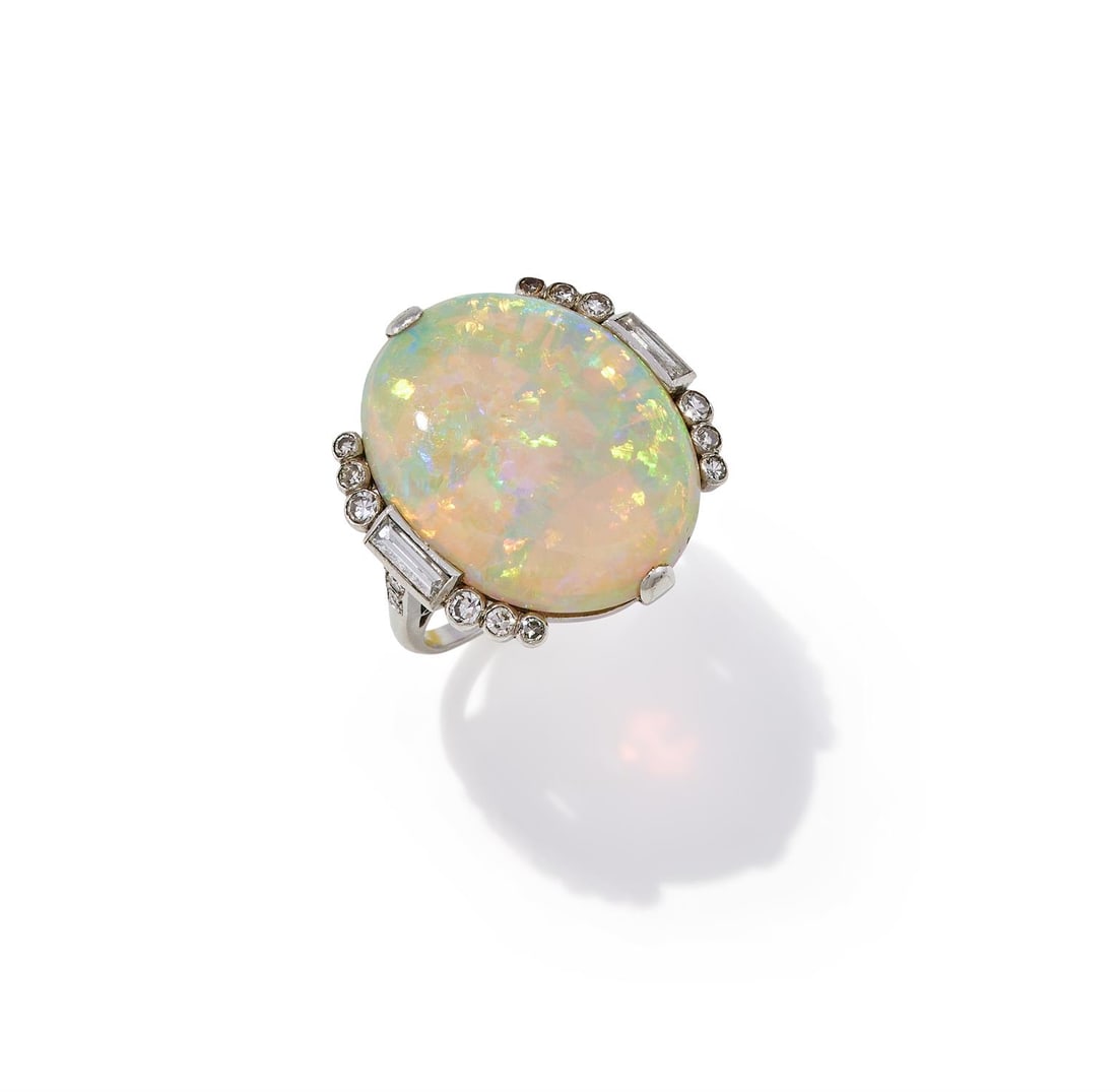 AN EARLY 20TH CENTURY OPAL AND DIAMOND RING (1 of 3)