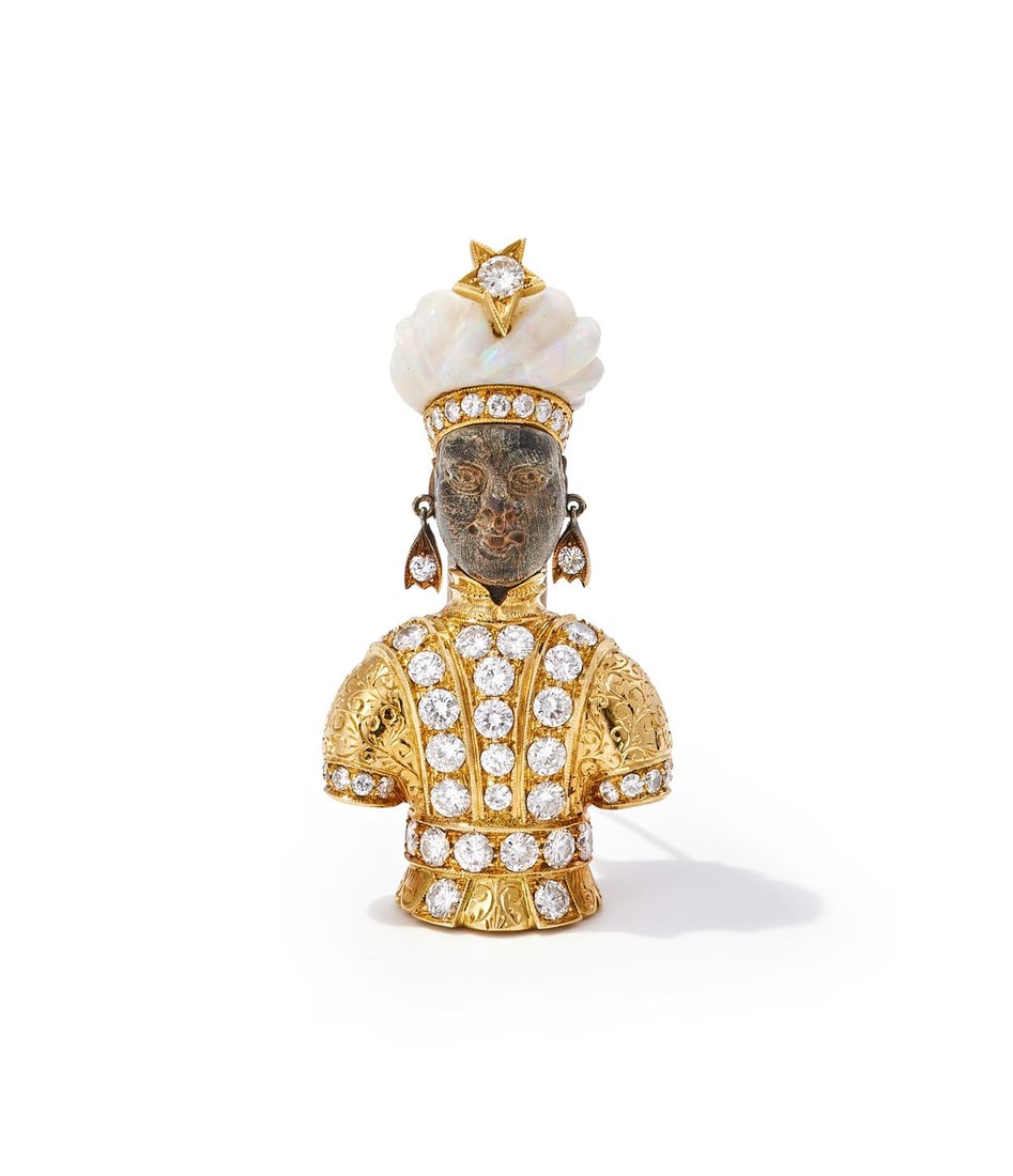 Y NARDI, AN OPAL AND DIAMOND 'MORETTO' BROOCH: Y NARDI, AN OPAL AND DIAMOND 'MORETTO' BROOCHThe carved tortoiseshell face surmounted by a carved opal turban with brilliant cut diamond band and star detail, diamond set earrings and an engraved and