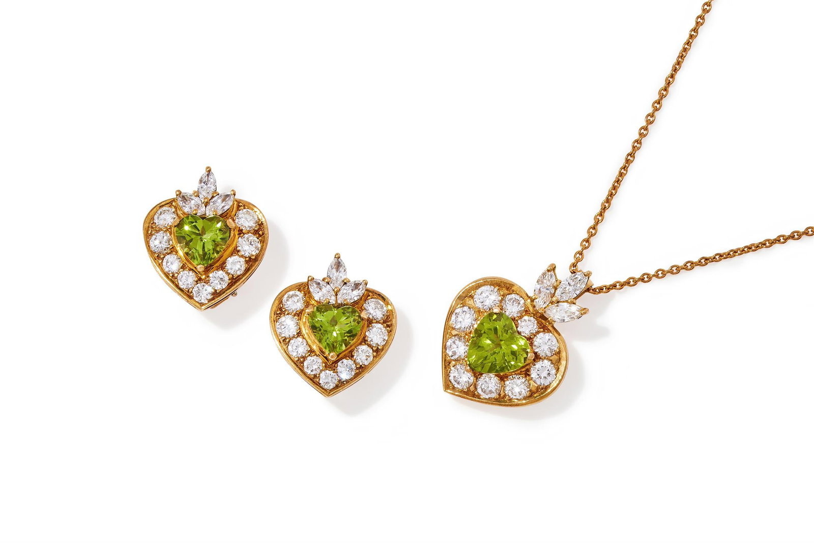 A PERIDOT AND DIAMOND PENDANT AND EARRING SET: A PERIDOT AND DIAMOND PENDANT AND EARRING SETEach designed as a heart shaped peridot within a brilliant cut diamond surround and marquise cut diamond trio surmount, earrings with clip fittings, pendan