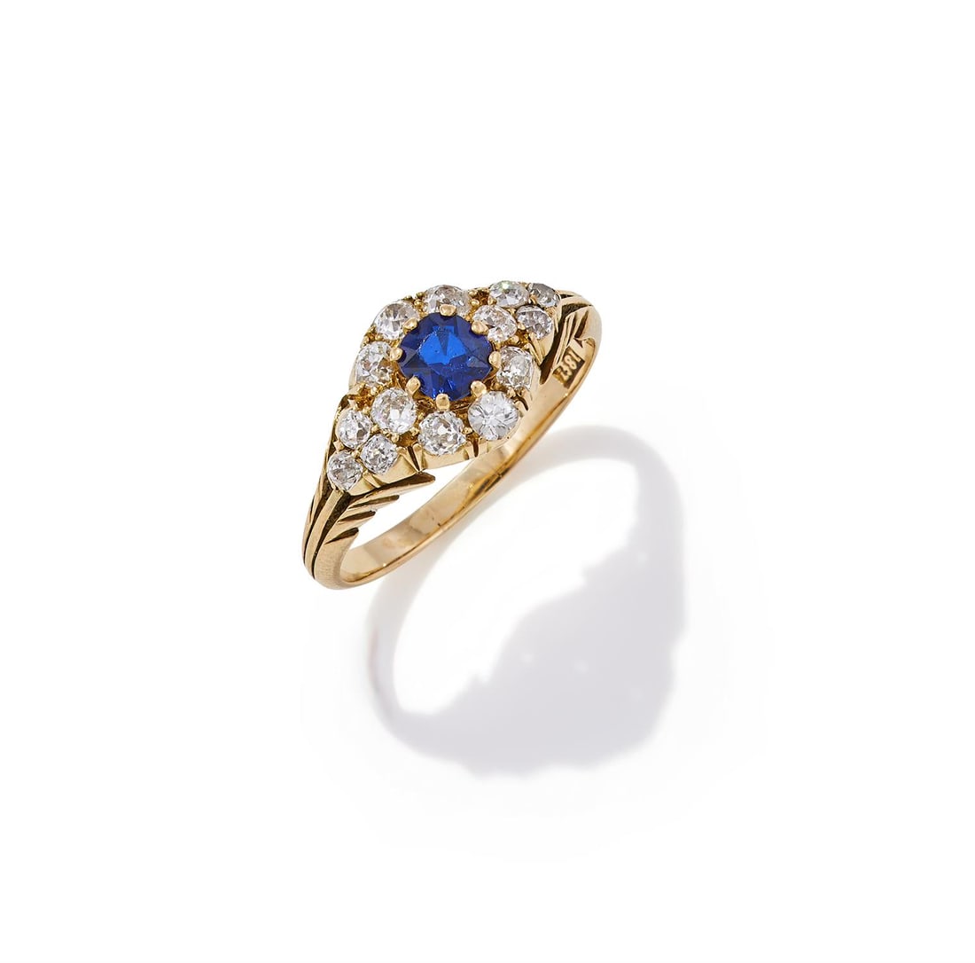 A SAPPHIRE AND DIAMOND CLUSTER RING (1 of 3)