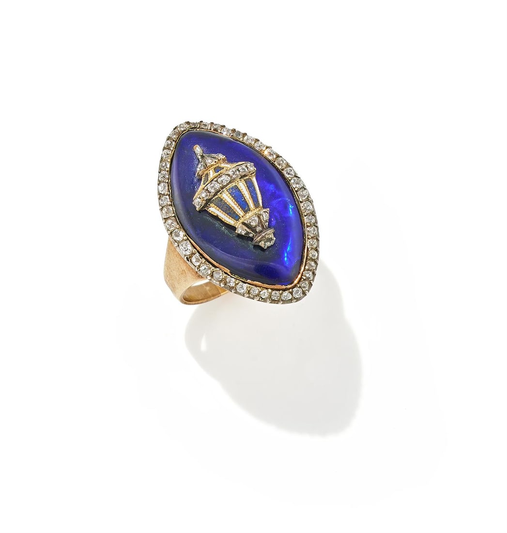 A GEORGIAN AND LATER DIAMOND SET MOURNING RING: A GEORGIAN AND LATER DIAMOND SET MOURNING RINGThe blue and white enamelled urn with diamond detail upon a blue glass panel within an old mine cut diamond border, engraved 'Robt Dinwiddie Esqr ob 27
