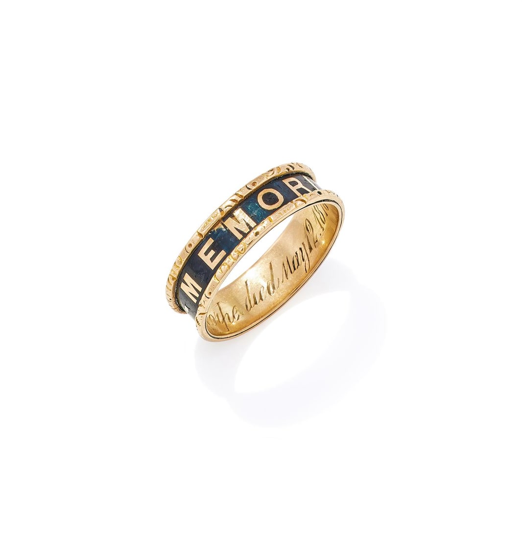 A VICTORIAN MOURNING RING: A VICTORIAN MOURNING RING BIRMINGHAM 1877 The 18ct gold band spelling In Memoriam on a black enamel ground, the inside of the shank inscribed St John Wells Thorpe died May 12. 1878, UK hallmark, A&S