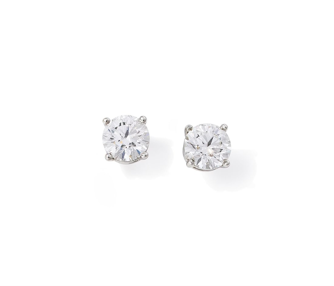TIFFANY & CO., A PAIR OF DIAMOND SINGLE STONE EARRINGS (1 of 2)