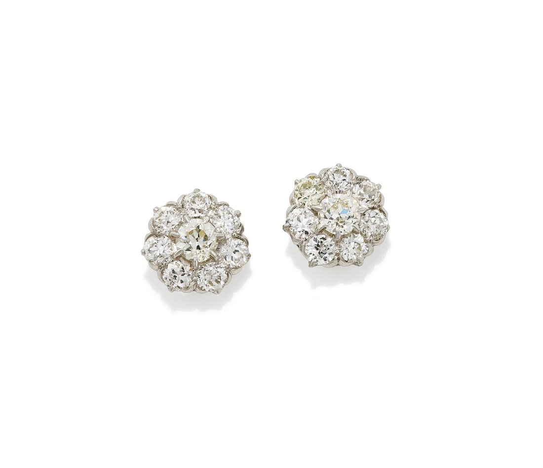 A PAIR OF DIAMOND CLUSTER EARRINGS (1 of 2)
